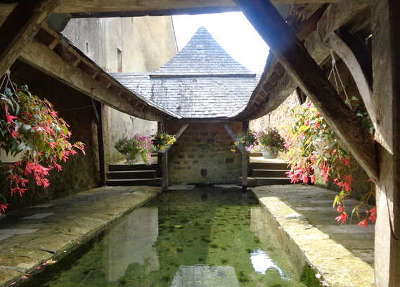 Asnieres sur vegre petite cite de caractere fontaine de devotion saint aldric puis lavoir routes touristiques de la sarthe guide du tourisme pays de la loire